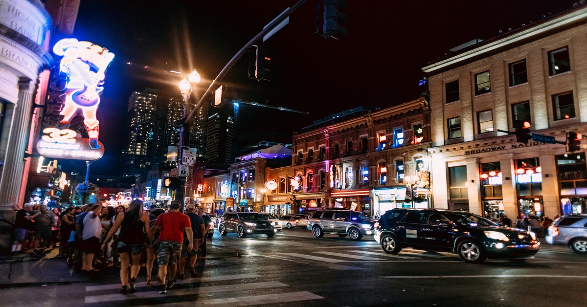 Crowd of people enjoying nightlife on Crescent Street in Montreal
