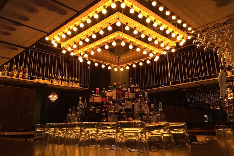 VIP table with bottle service inside a Montreal strip club