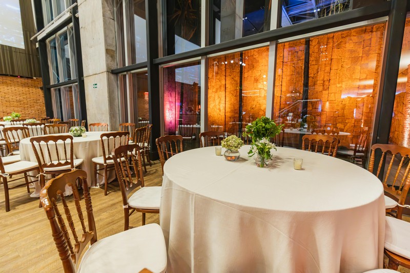 Assorted party lights for hotel rooms including LED strips, fairy jar, and disco ball on a table