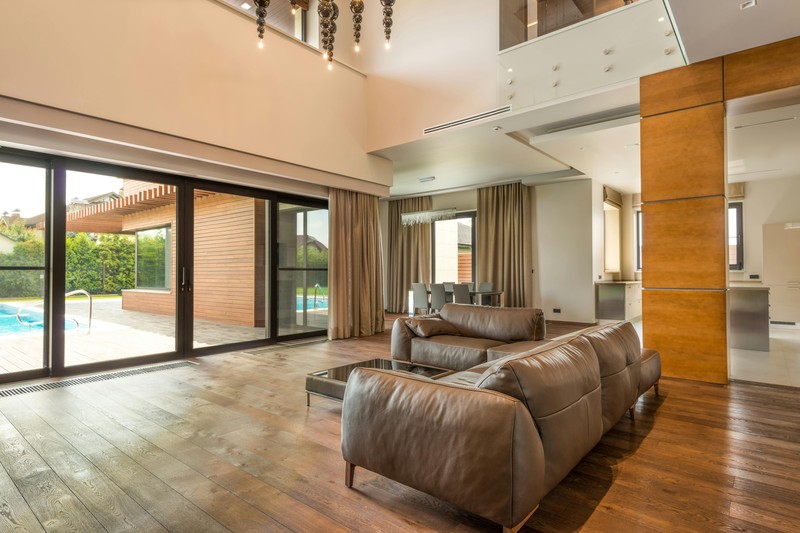 Spacious vacation rental living room with pool table and modern seating area
